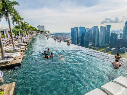 703326_the-marina-bay-sands-hotel-in-singapore-has-a-stunning-infinity-rooftop-pool-on-the-hotels-57th-floor-where-guests-can-swim-and-admire-the-singaporean-skyline